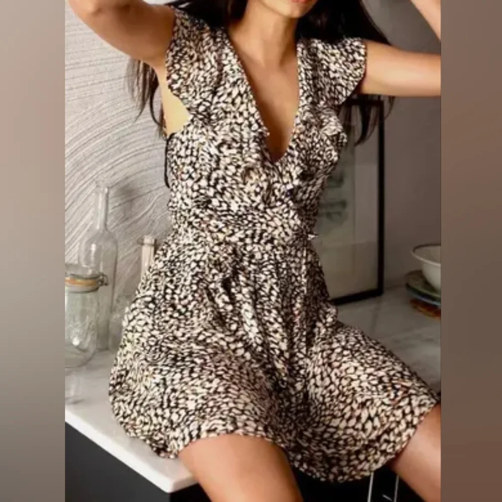 Free People French Quarter Mini Wrap dress cheetah print‎ size L